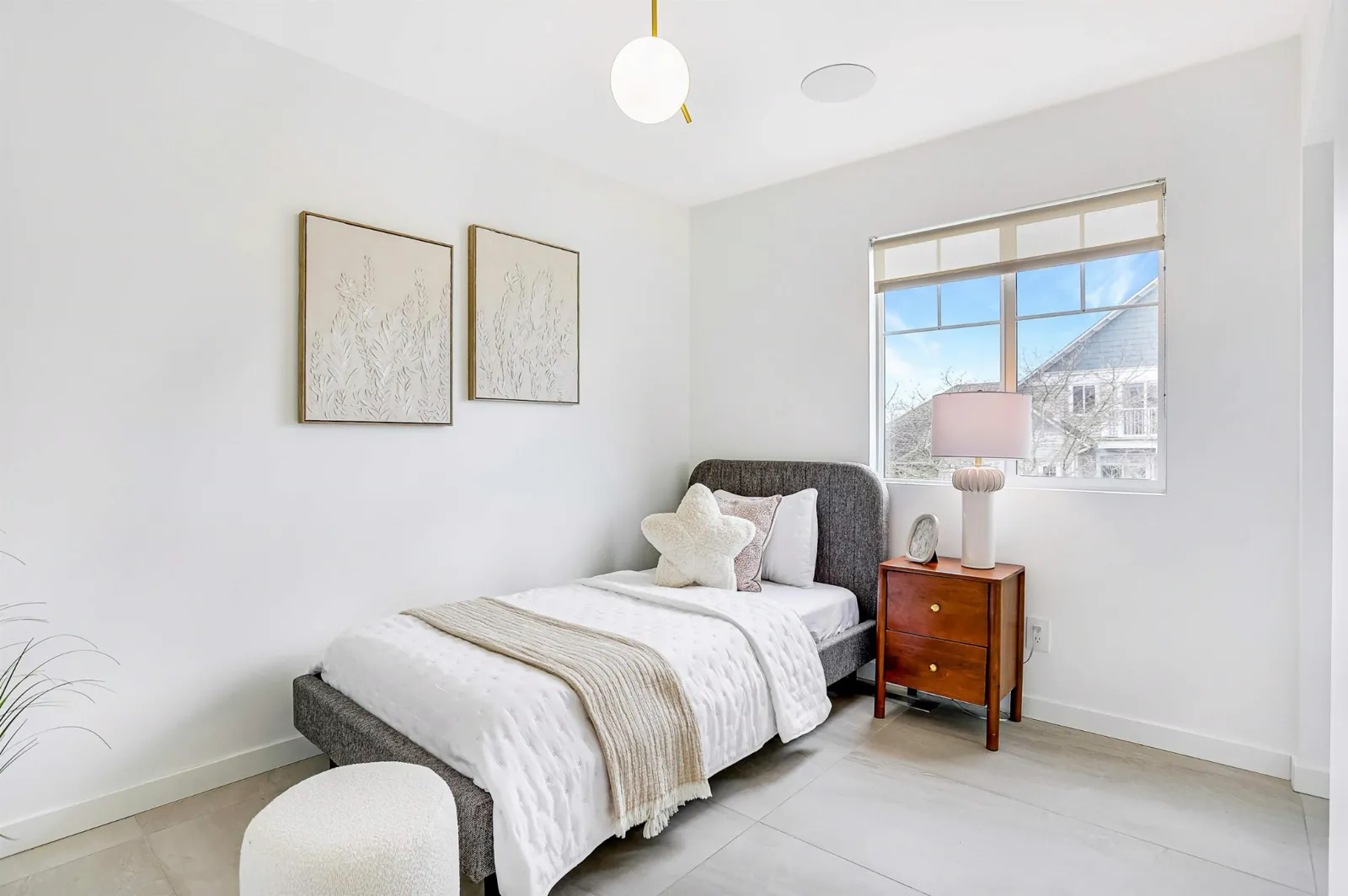 Bedroom staged by West Coast Interiors